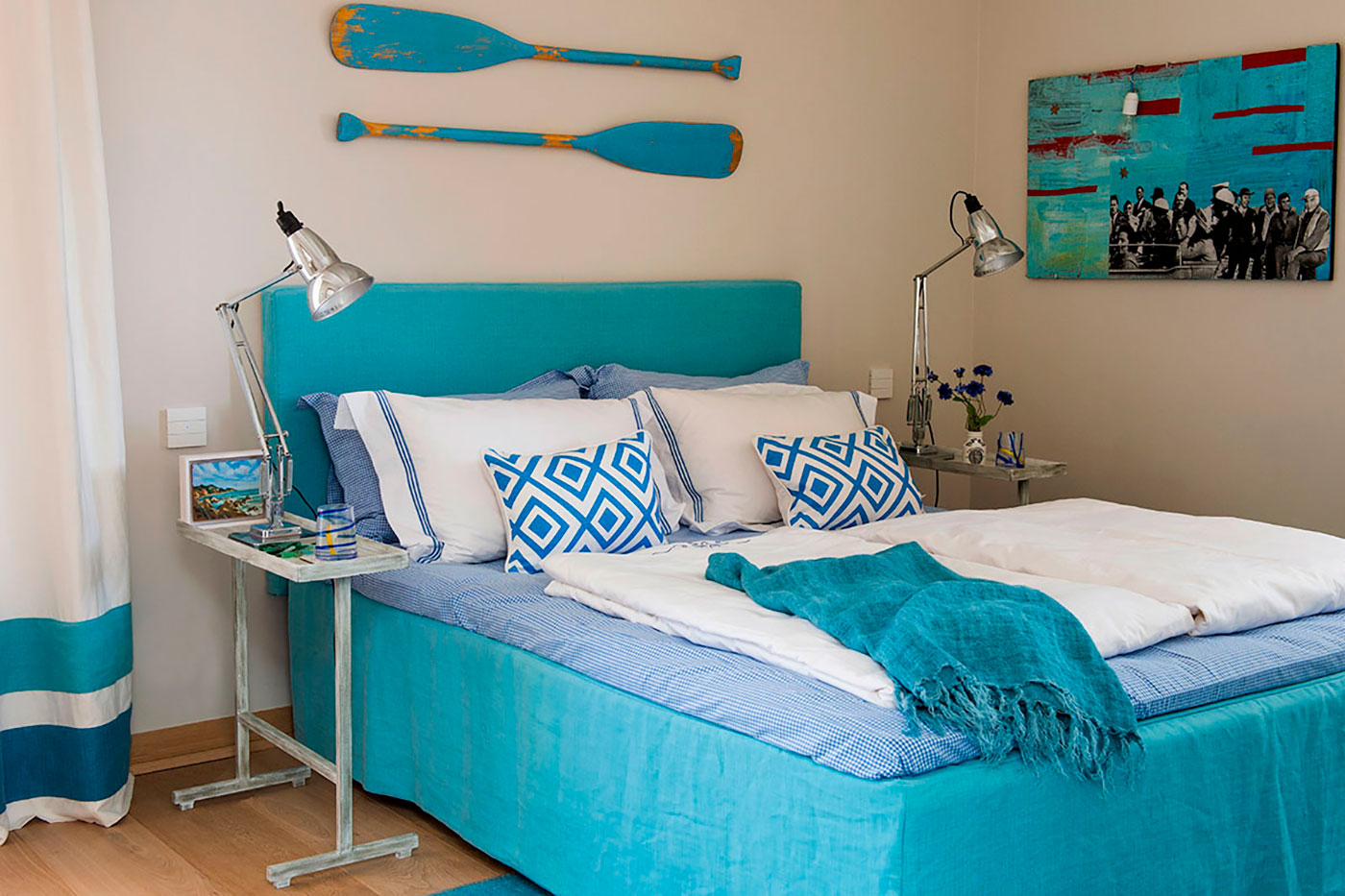 Elegant bedroom furniture and cozy bedding.