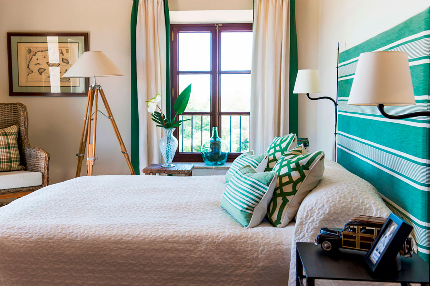 Elegant bedroom furniture and cozy bedding.